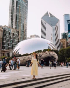 Girl in front of the Bean in the afternoon